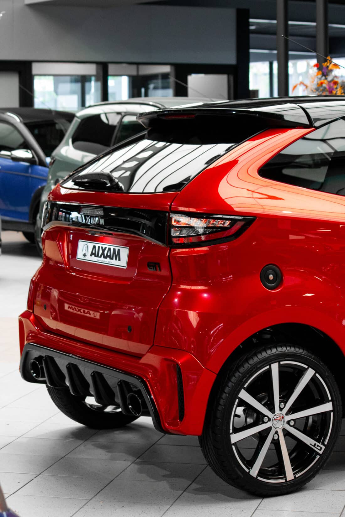 Aixam Crossover Premium Ambition E5 2025 Brommobiel Parelmoerrood Metallic Kopie