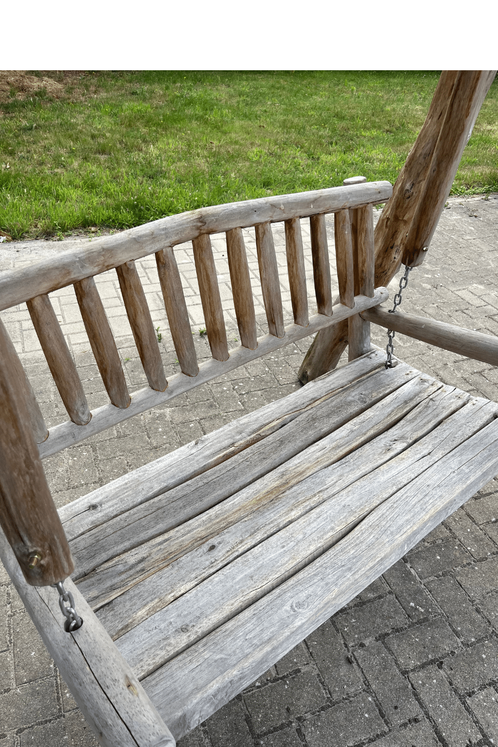 teak houten schommel bank voor in de tuin