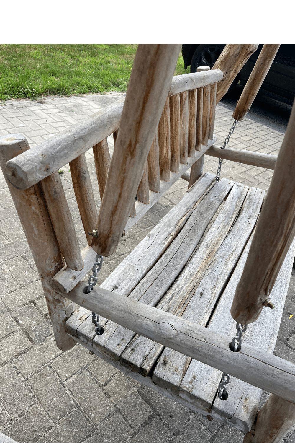 teak houten schommel bank voor in de tuin
