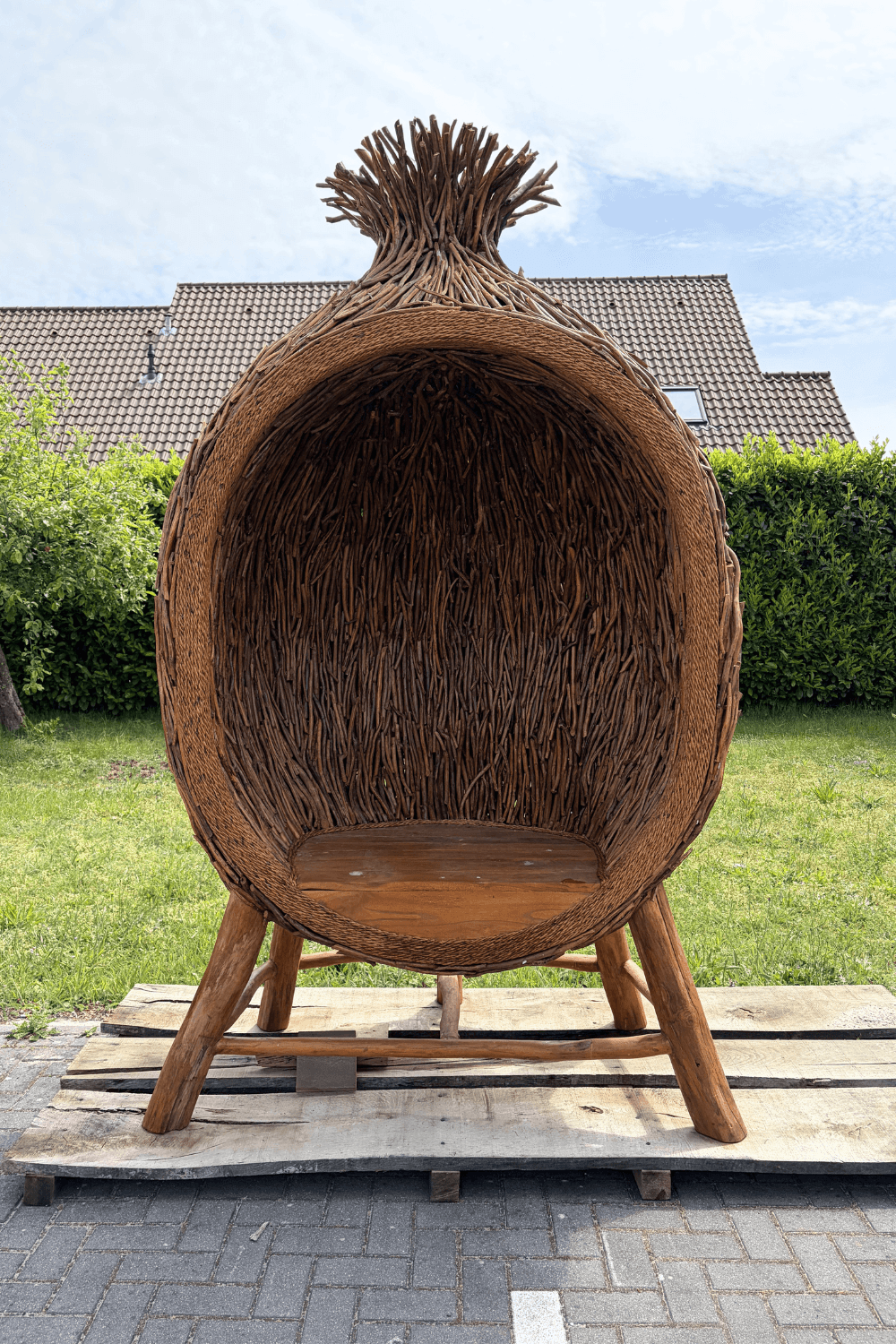 Photobooth voor buiten een houten vogelnest gemaakt van takjes