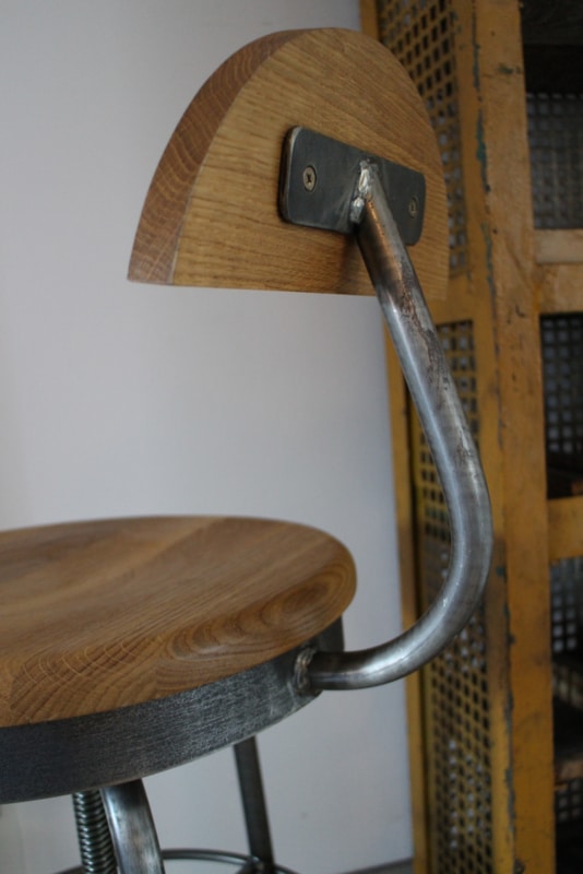 Industrial stool adjustable in height with backrest