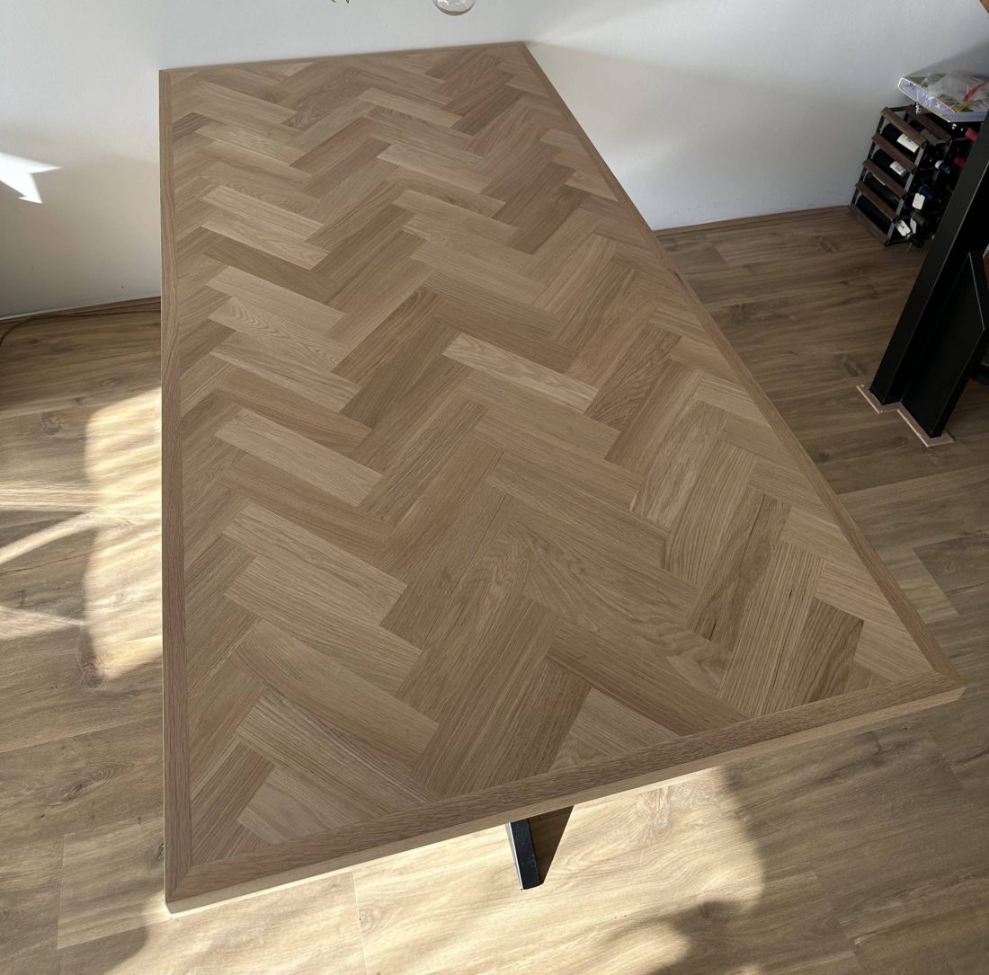 Mosina herringbone oak table 200 x 100 x 4cm with thin edge and matrix base 8 x 4cm with black coating
