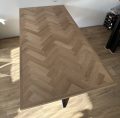 Mosina herringbone oak table 200 x 100 x 4cm with thin edge and matrix base 8 x 4cm with black coating