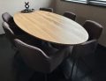 Obra oval oak table 220 x 100 x 4cm with 1x45 degree tapered edge with matrix base 8 x 4cm bare steel with transparent coating