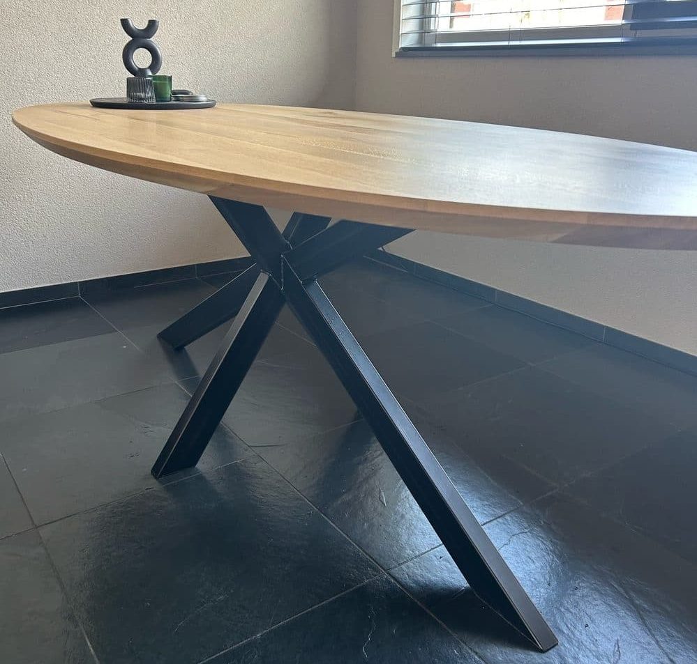 Obra oval oak table 220 x 100 x 4cm with 1x45 degree tapered edge with matrix base 8 x 4cm bare steel with transparent coating