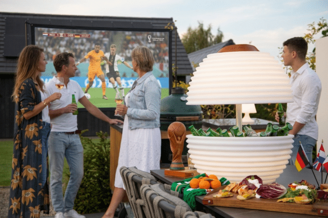 Watching the World Cup in the garden with a large drinks cooler