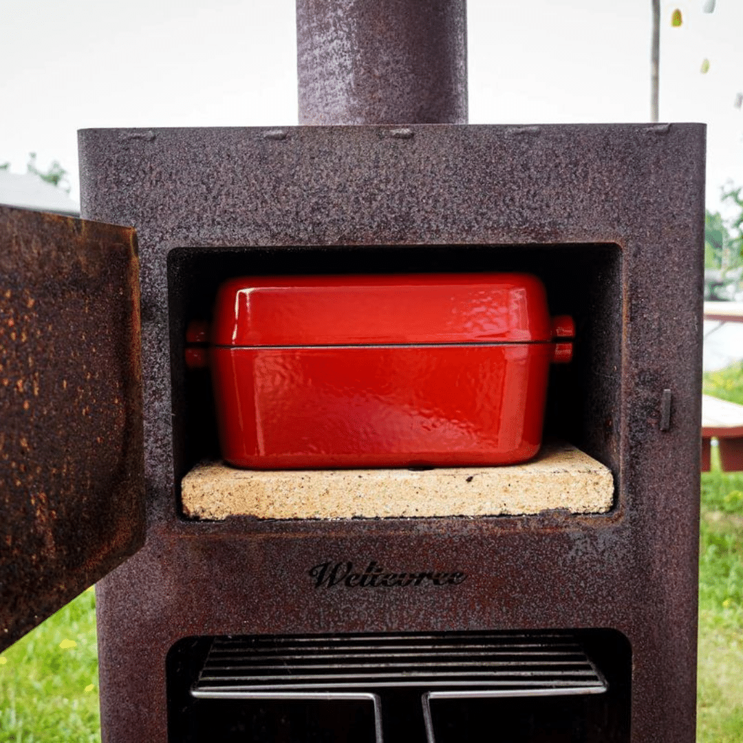 Outdooroven van Weltevree met rode ovendish