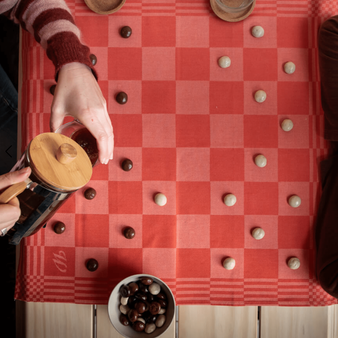 Weltevree tea towel orange checkers with chocolate peppercorns