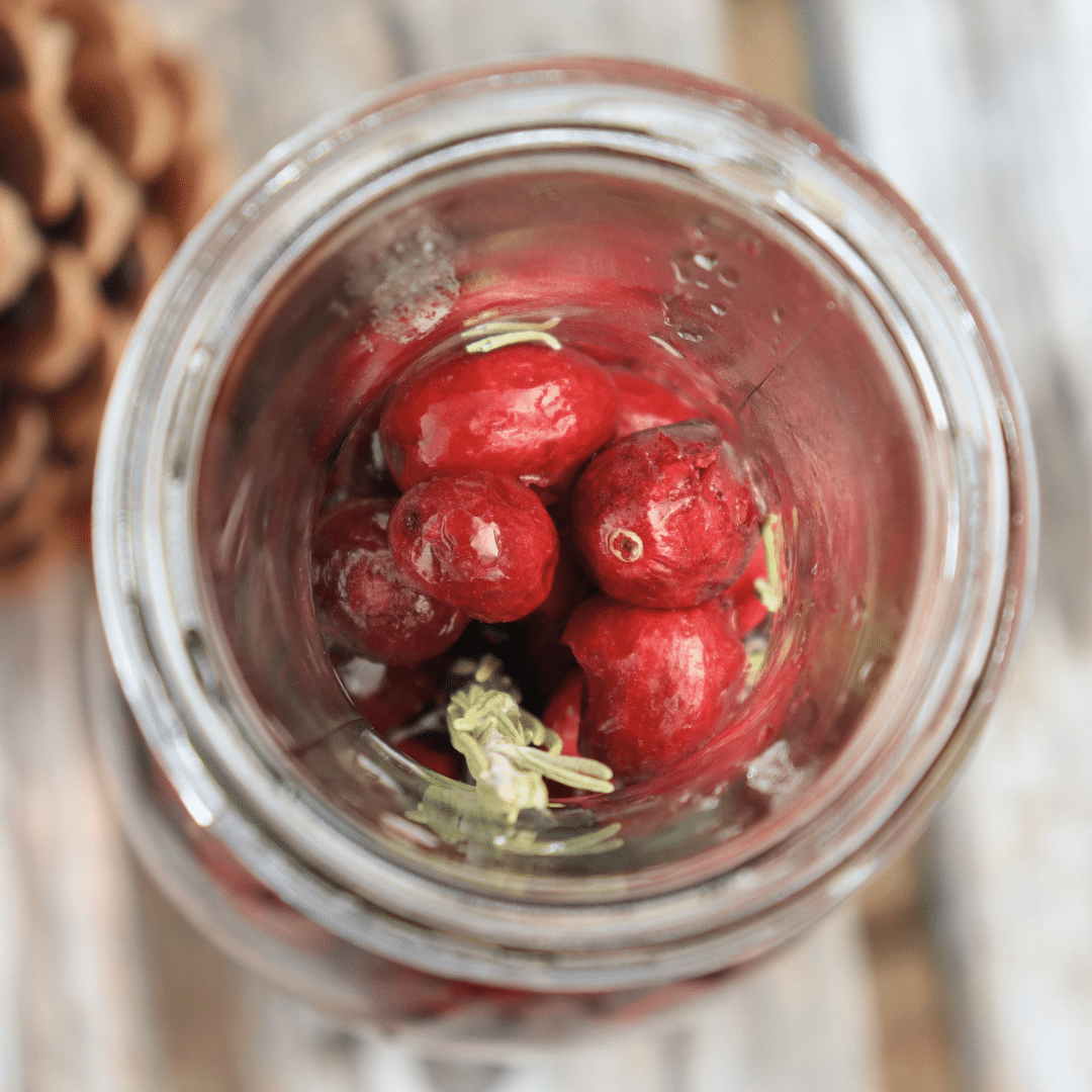Pineut table water cranberry rosemary