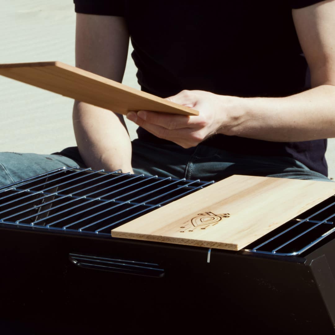 Take this portable and foldable BBQ to the sea
