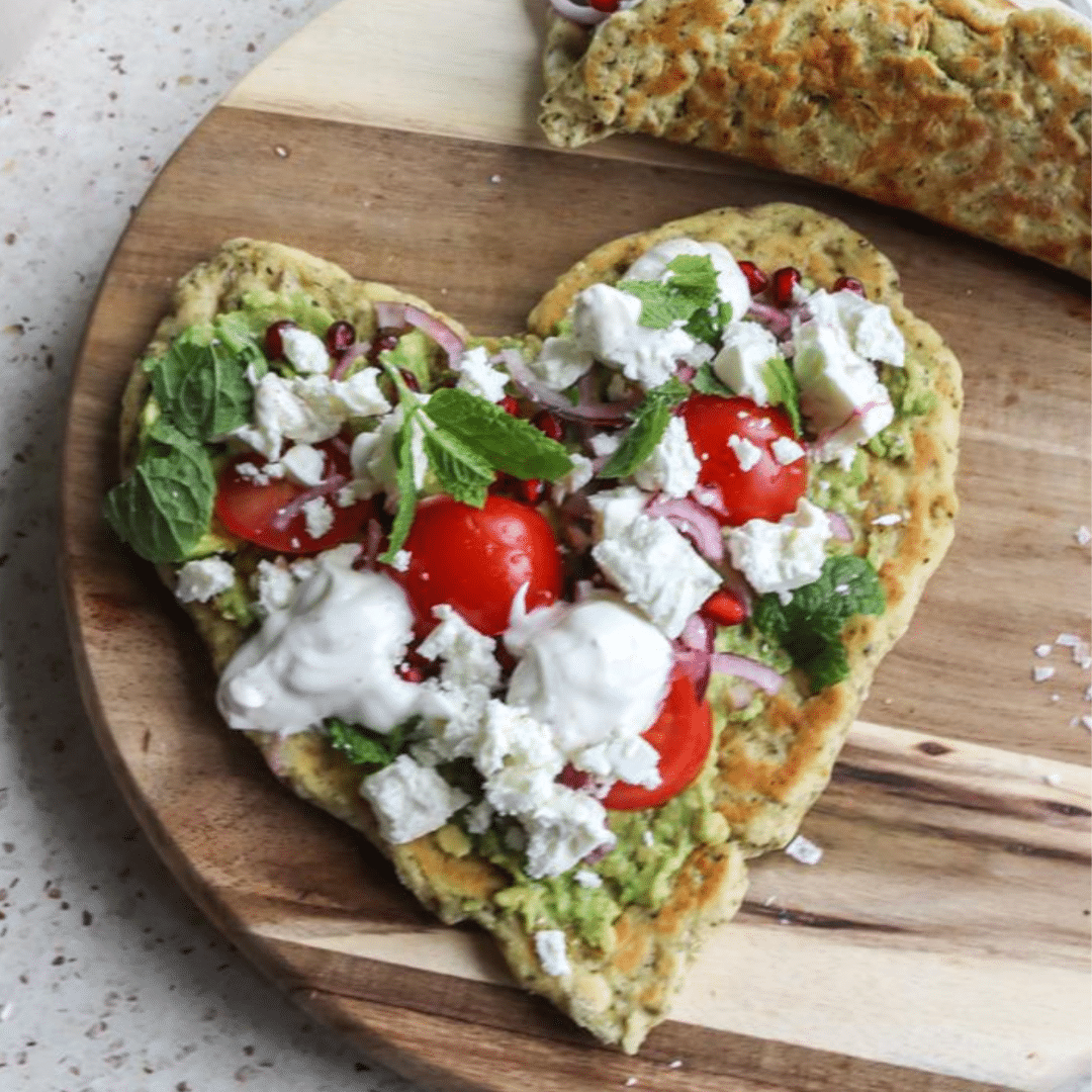 Pita bread heart with delicious toppings